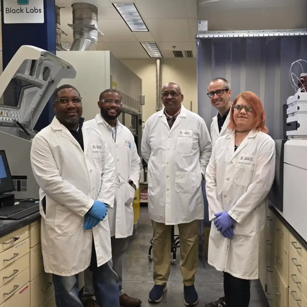5 American Analytical scientists in a lab at UA Tech Park