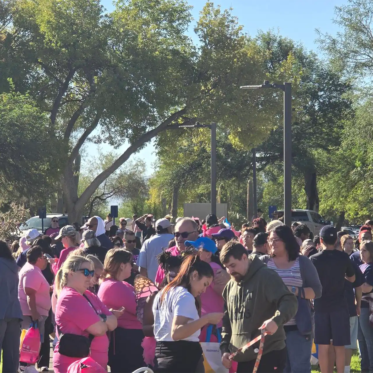 Attendees outside at breast cancer awareness event