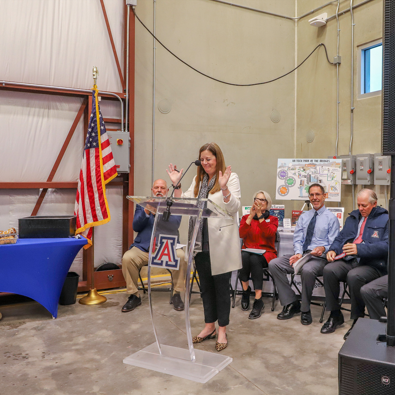 Woman speaking at a podium