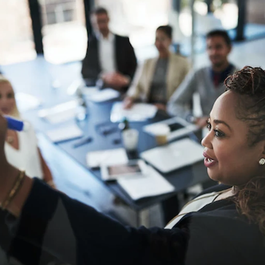 Woman talking to professional group