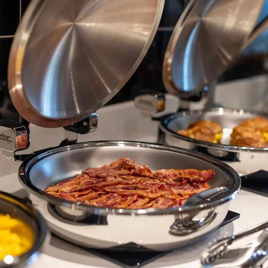 Bacon in hot serving dish.