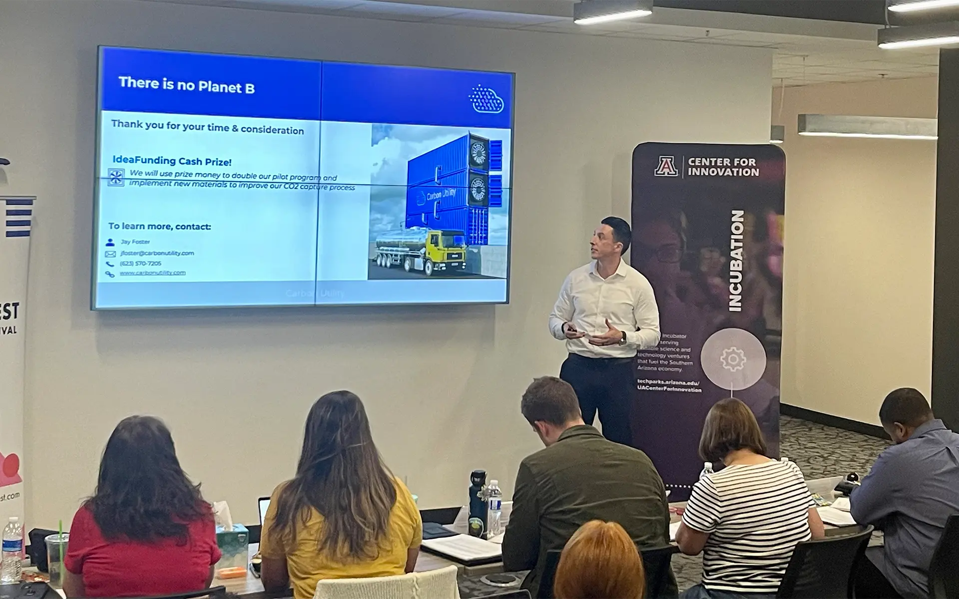 Startup founder presents Carbon Utility CO2 capture innovation pitch during IdeaFunding at UArizona Center for Innovation.