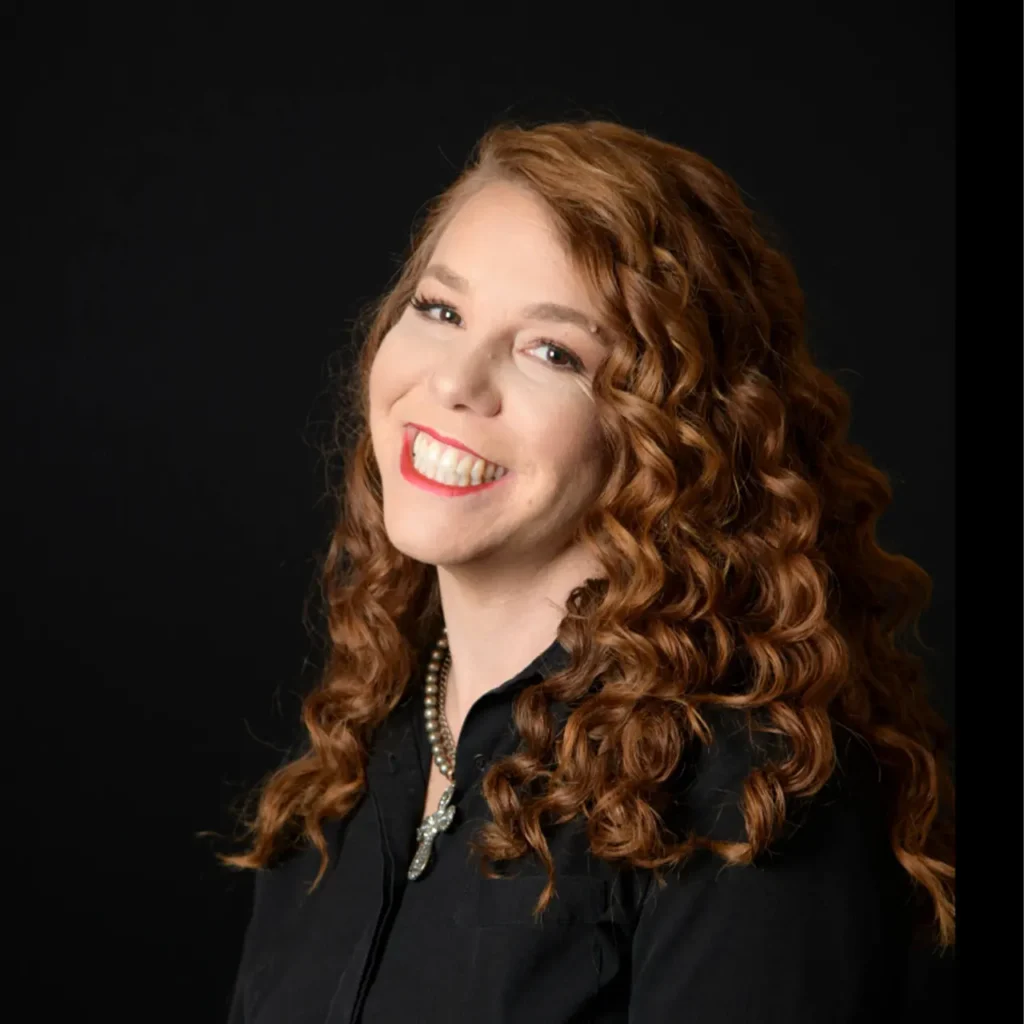 Headshot of Jessa Turner wearing a black blouse.